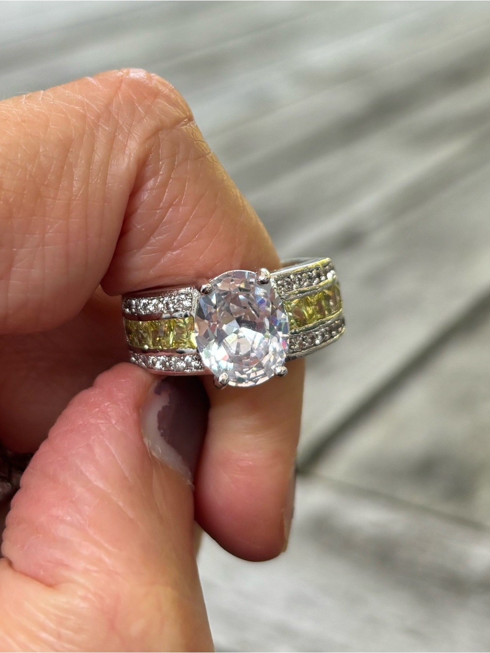 Sparkling Faceted Oval Clear Stone Ring  with Yellow Side Stones - size 8